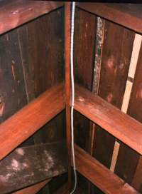 Cut away roof sheathing at the ridge 
and install outlet vents